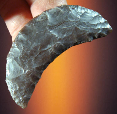 Cast of a Clovis crescent from the Fenn cache.