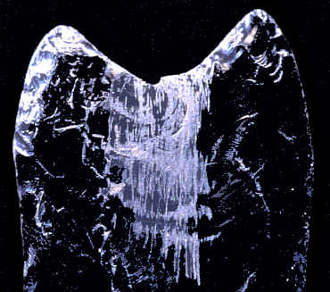 Obsidian Clovis from Fenn cache, scratches on base.