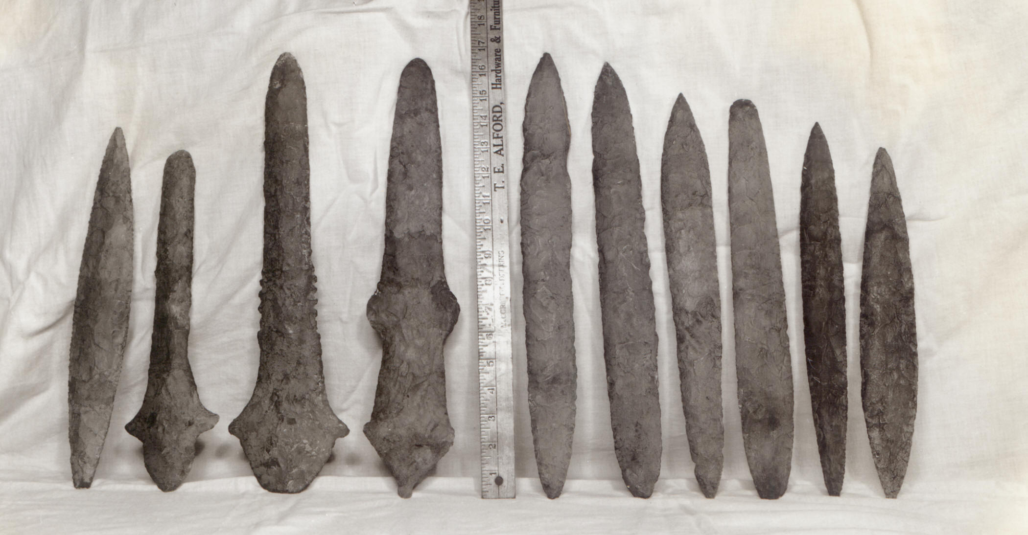 7 "swords" and 3 maces from Craig Mound, Spiro.