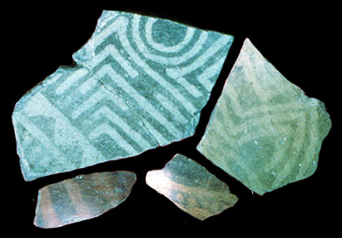 Four negative painted potsherds from Cahokia.