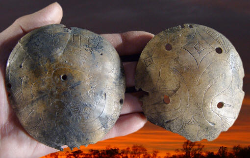 Two engraved human bone rattles from Pinson Mounds.