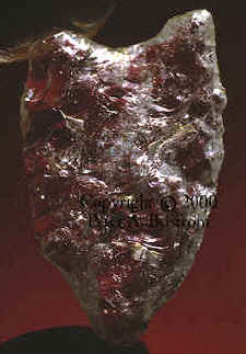 Clovis point made of clear quartz crystal.
