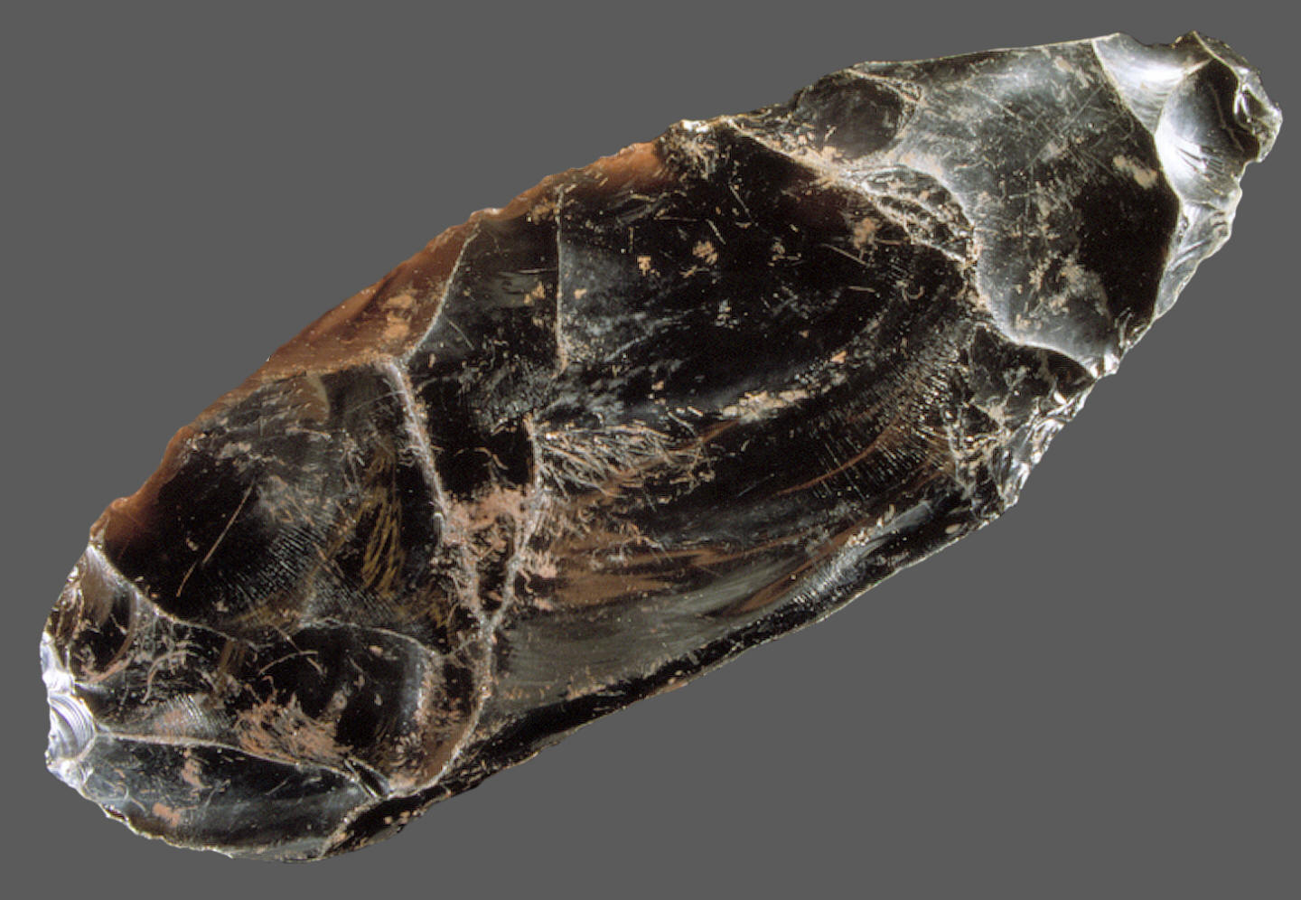 Obsidian biface with large over-shot flaking, Fenn cache.