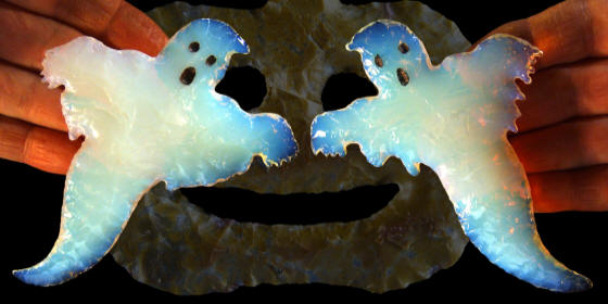 Abstract image of Dan Theus ghosts and pumpkin.