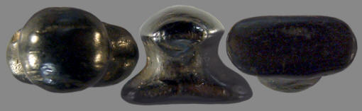 A labret made of coal from Alaska.