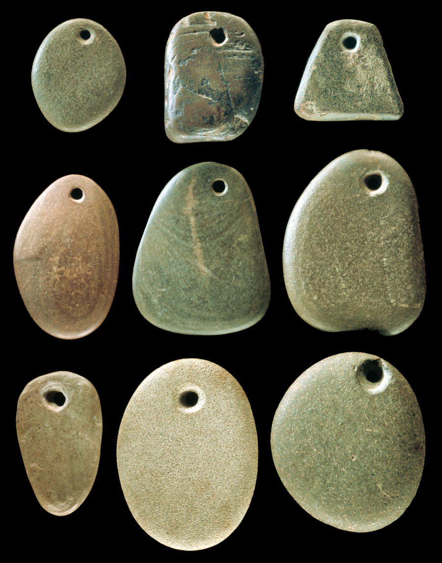 Nine pebble pendants from Illinois.