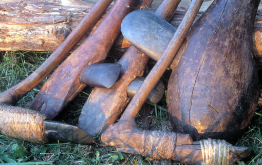 3 stone axes and 2 stone adzes from New Guinea.