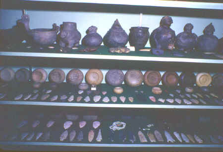 Ed Meiners cabinet of prehistoric artifacts.