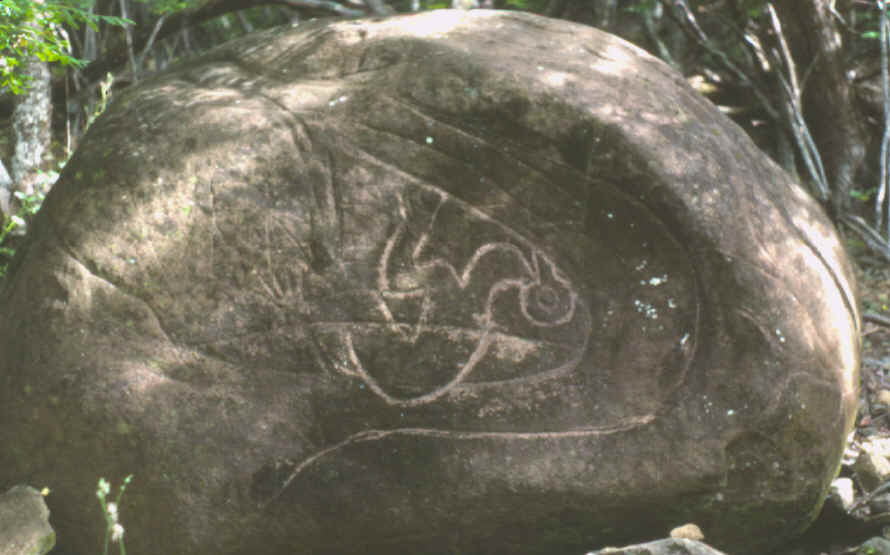 Easter Island boulder with Birdman engraving.