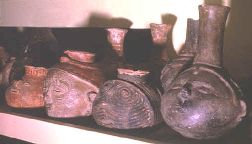 Row of "head pots" in Gilcrease Institute Collection.