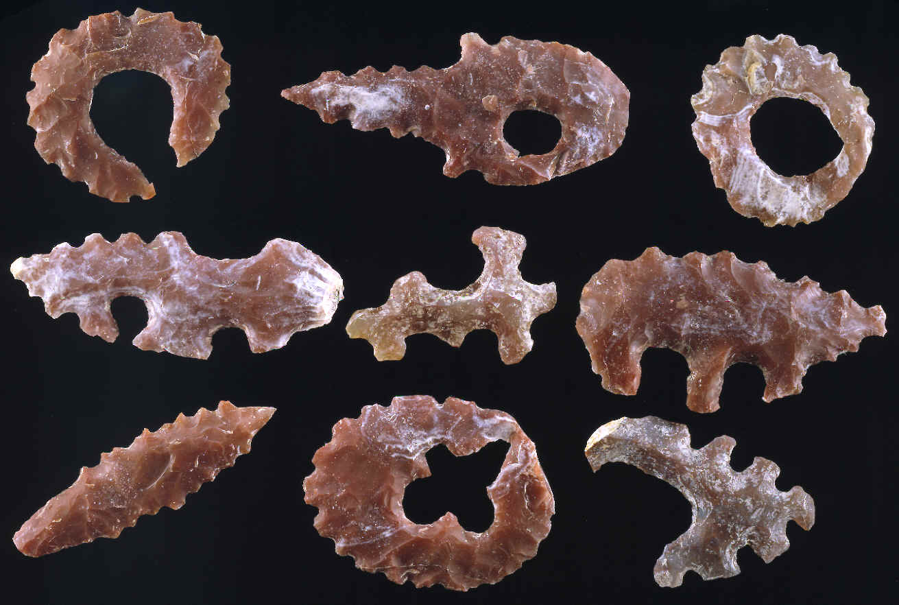Cache of 9 Mayan eccentrics made of red chalcedony.