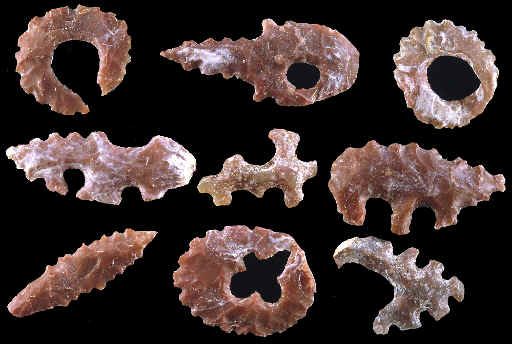 Cache of 9 red chalcedony Mayan eccentrics.