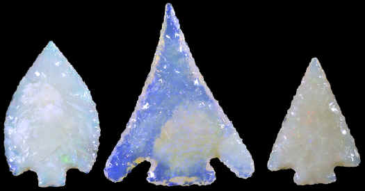 Three Australian opal arrowheads.