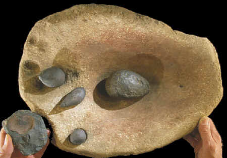 Plummet grinding stone with hematite & plumet.