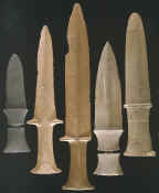 Group of 5 ground slate daggers.