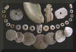 Several shell beads from the Mitchell site in South Dakota.